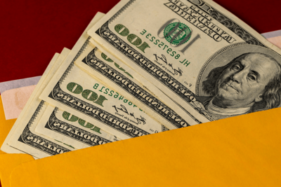 A Man Bought a House for $1,000. Then He Found $10,000 in Envelopes Buried in the Basement