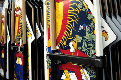 How did Atari apply side art to Arcade Cabinets?