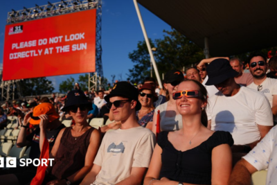 Solar eclipse distracts from sporting events - in pictures